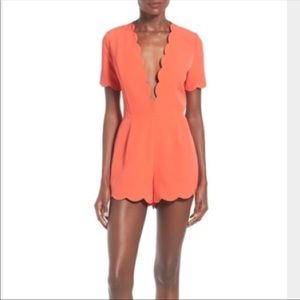 Storee orange low cut romper